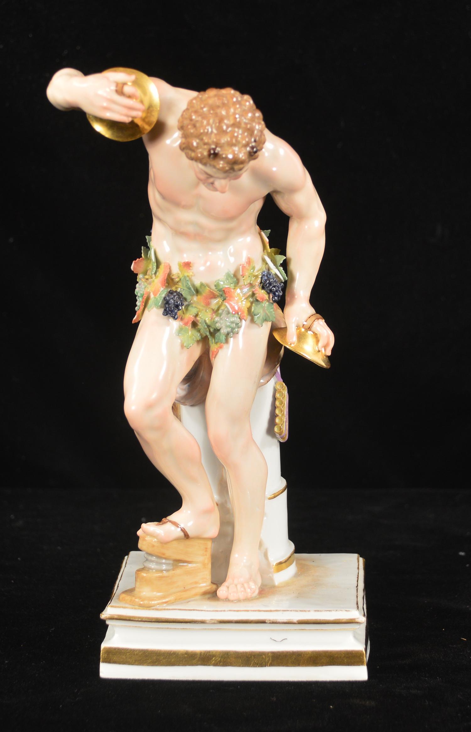 Meissen figure of a man: Meissen porcelain figure of a man holding cymbals and standing next to a stump with multi color flowers around his waist, 9" high, AF some chips