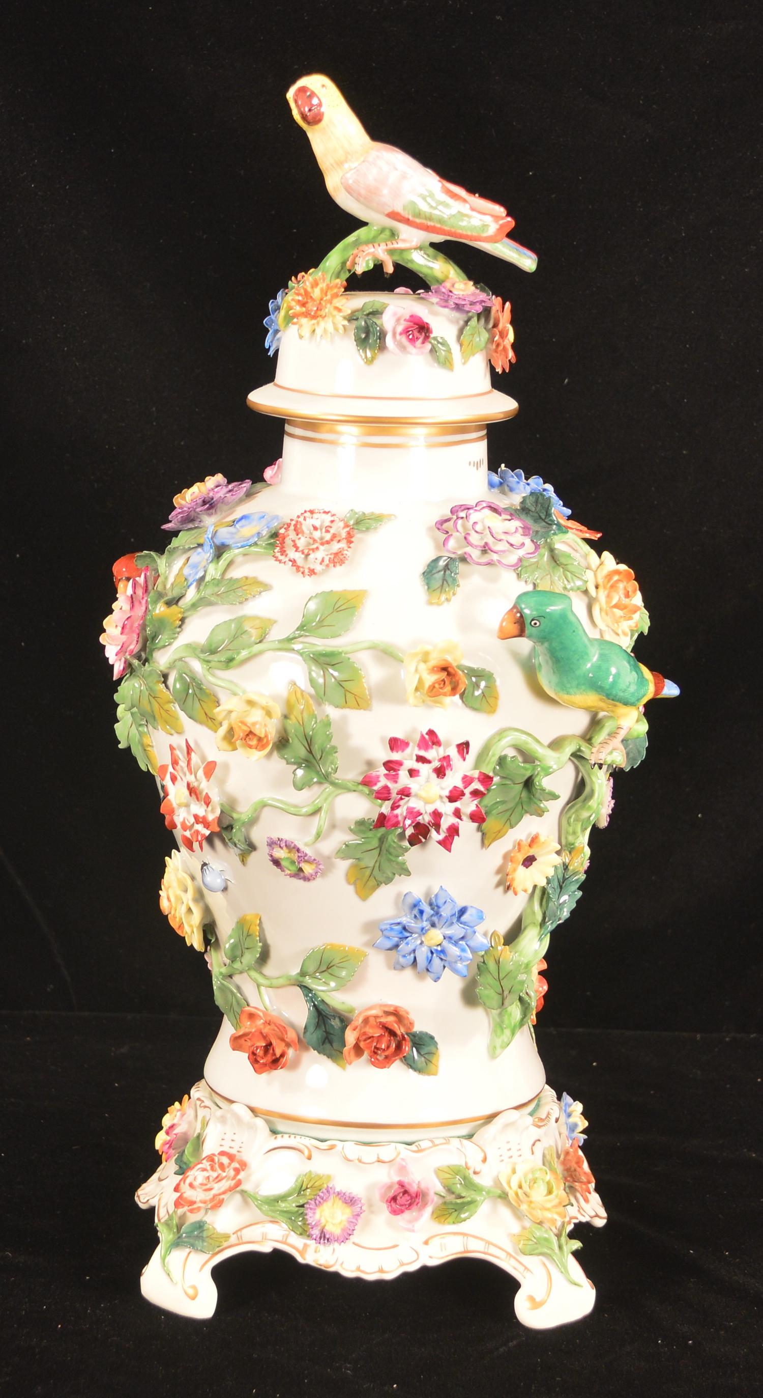 Dresden capped urn: Dresden porcelain capped urn with applied multi color birds and flowers on a matching plinth, 19" high
