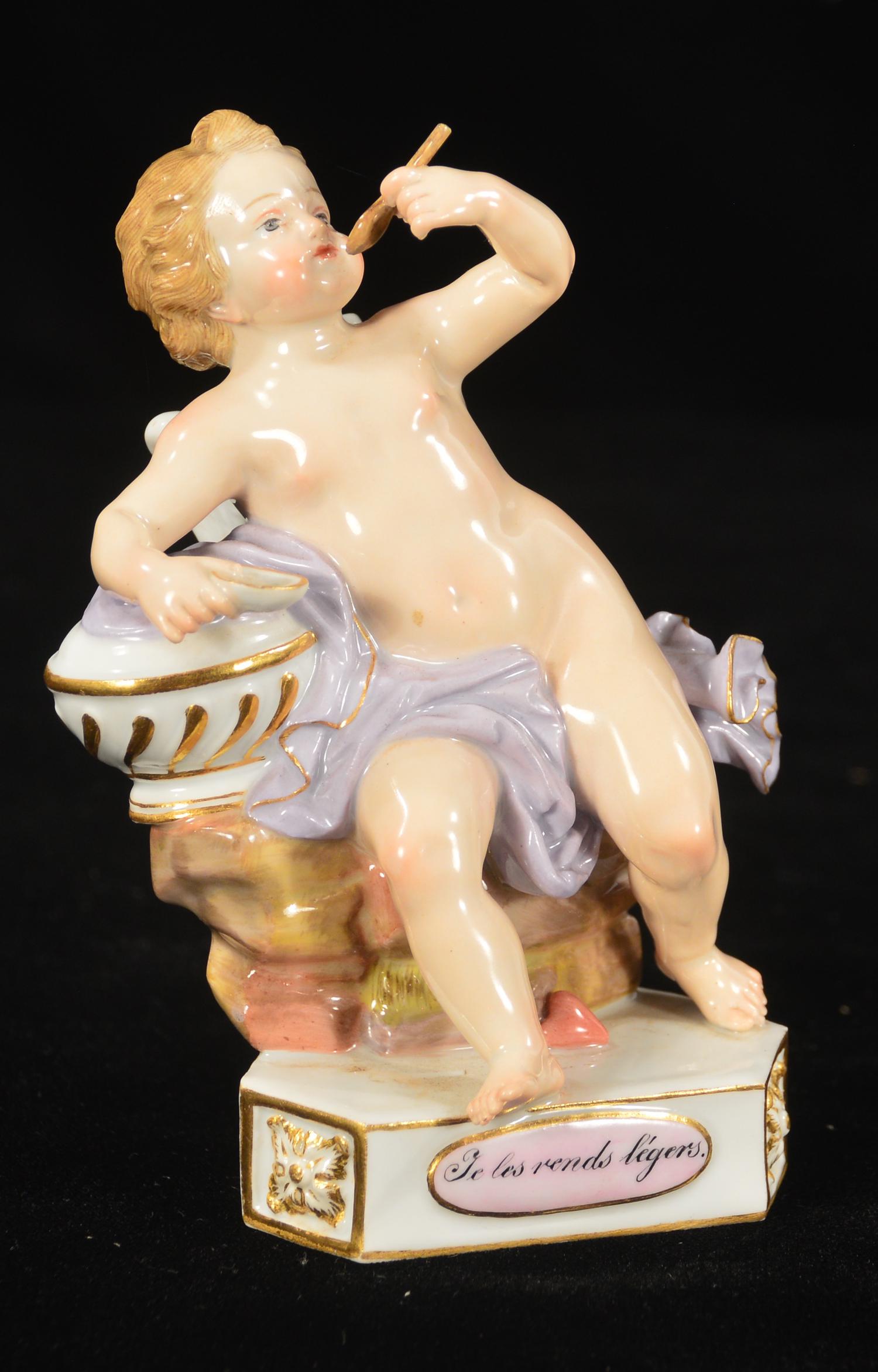 Meissen porcelain figure: Meissen porcelain figure of a young boy seated on rocks with a bowl in one hand and spoon in the other, 5" high