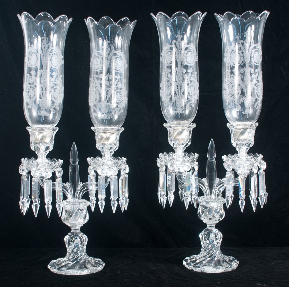 Pair of Baccarat crystal candelabra: Pair of Baccarat crystal two light candelabra with etched hurricane shades and crystal prisms, 10\" wide, 23\" high