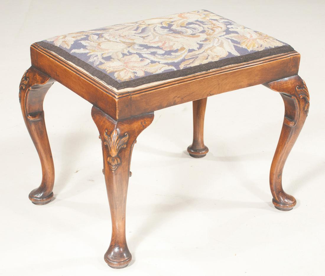 English walnut stool: 19th century English walnut stool with tapestry seat on carved cabriole legs on pad feet, 23.5" wide, 18" deep, 19" high