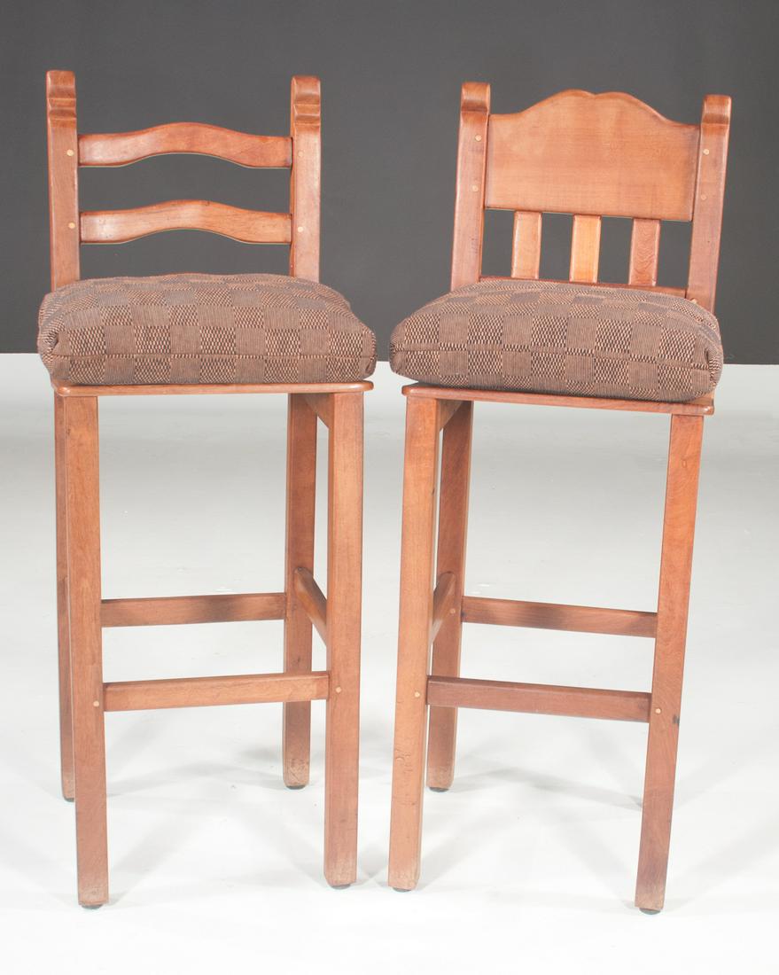 Companion pair of wood bar stools: Companion pair of wood bar stools on straight legs with under stretchers having cushions for the seats, 17" wide, 17" deep, 47" high
