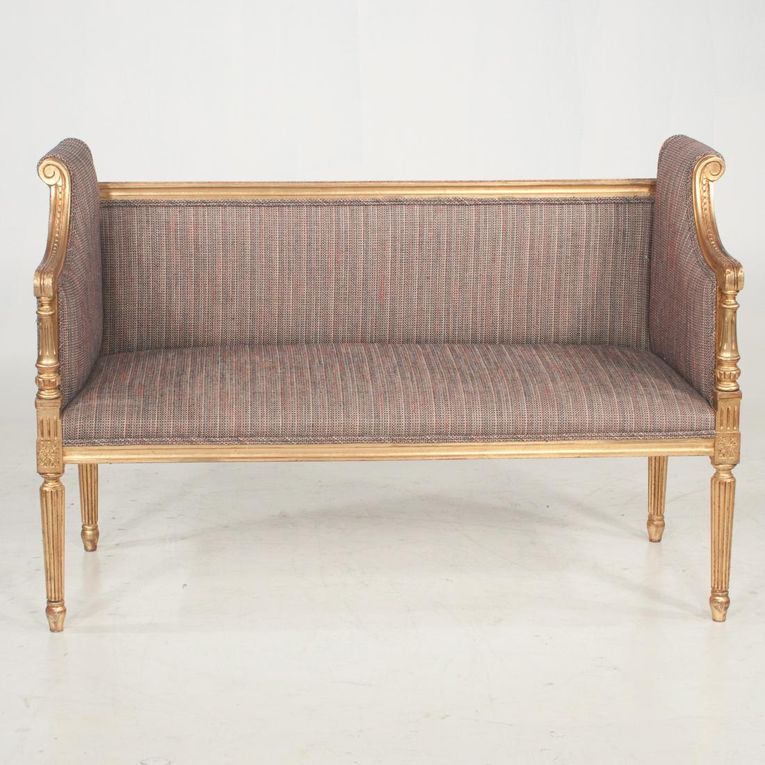 Vintage Louis XVI style giltwood settee: Vintage Louis XVI style giltwood settee with roll arm sides, column arm supports, carved knees and fluted legs with unique scrolled sides, 46" wide, 18.5" deep, 31" high