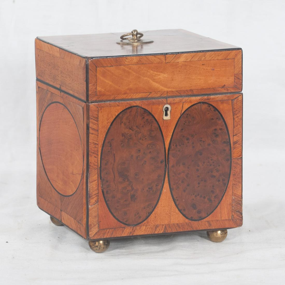 Sheraton mahogany tea caddy with oval inlay (1 of 7)