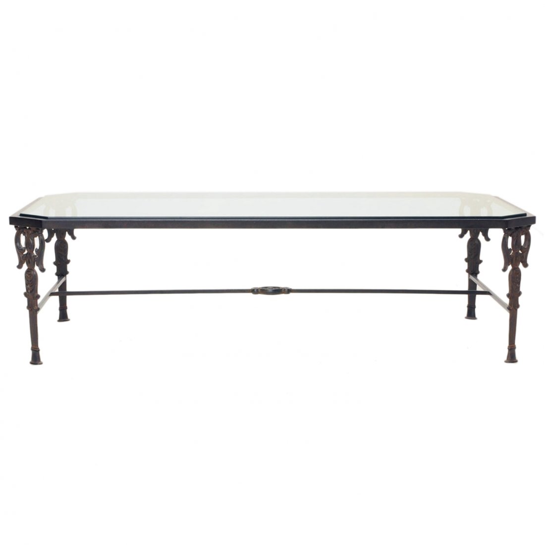 Iron and glass top coffee table: Iron and glass top coffee table having scroll and reeded legs with under stretcher, 60" wide, 32" deep, 17" high