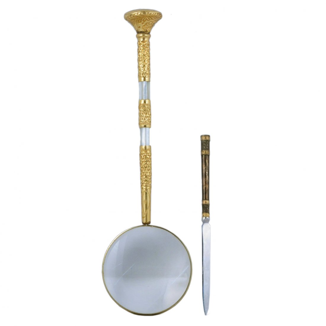 Mother of pearl and embossed brass magnifying glass and: Mother of pearl and embossed brass magnifying glass, 13.5" long, along with a letter opener, 8" long, 2 pieces