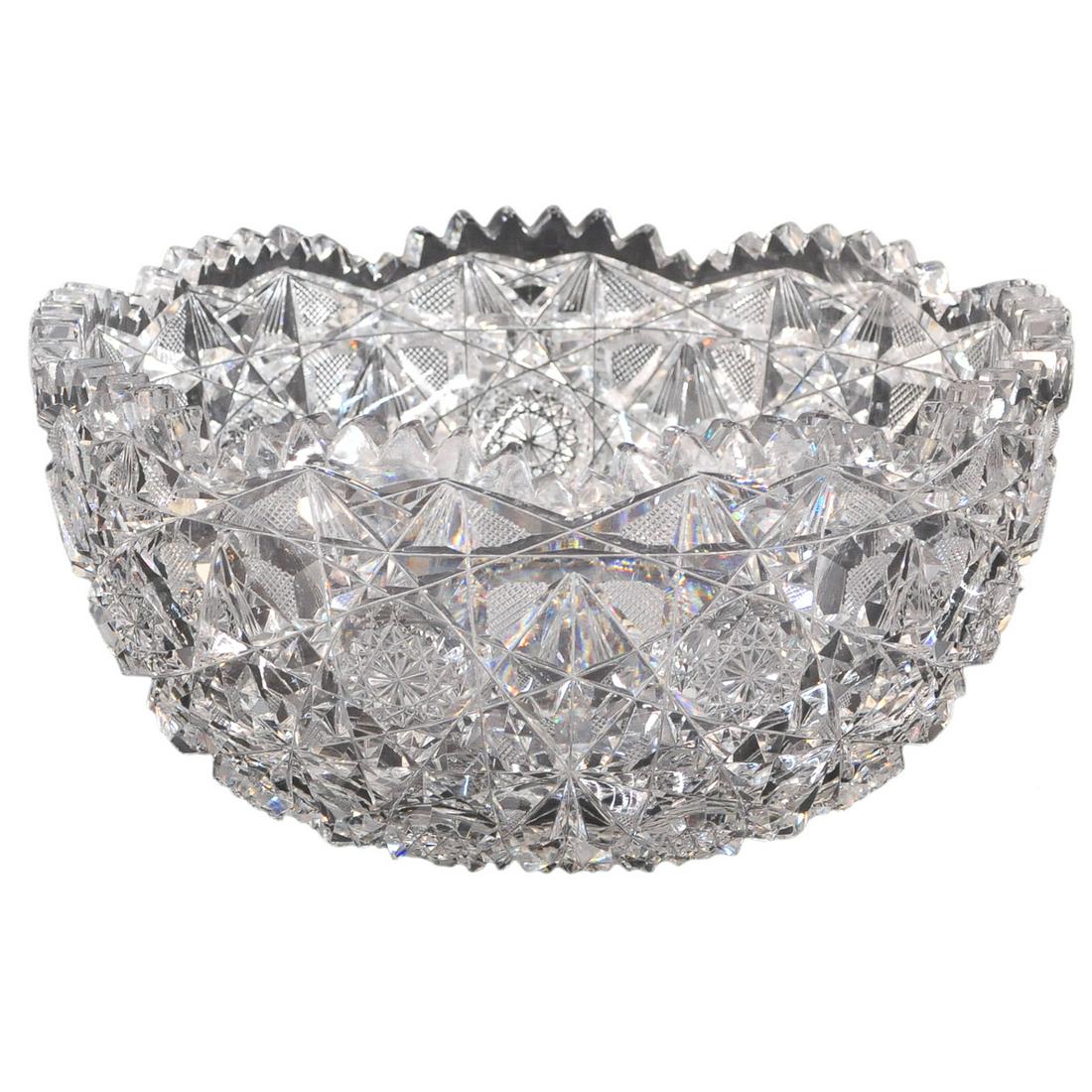 American brilliant cut glass bowl: American brilliant cut glass bowl with scalloped top having pinwheel and diamond cut design, 9" diameter, 4.5" high