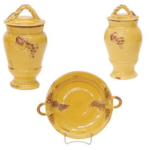 Arte Italica Ceramic Grouping: Arte Italica Ceramic Grouping, Double Handled Charger with Leaf and Grape Raised Decorations, 16.5" Wide and 13.5" High, and Two Matching Covered Urns, 12" High and 10.5" High. Three Pieces