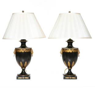 Tole Urn Formed Lamps Having Black Lacquered Bodies: Tole Urn Formed Lamps Having Black Lacquered Bodies with Gilt Floral and Feather Highlights and Brass Lion Head Handles. 27" High