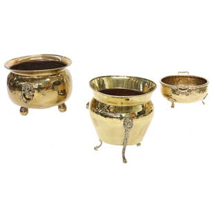 Group of Three Vintage Round Brass Planters: Group of Three Round Brass Planters, Small Round Planter on Brass Feet with Shell Carved Knees and Brass Handles, 7" Diameter, 4" High; Medium Round Planter on Shaped Ball Feet and Having Lion Face Ri