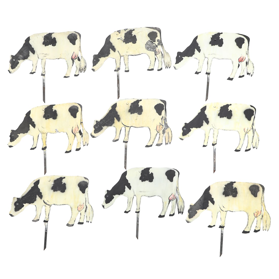 S. Ladeira Collection of Hand-Painted Small Cow Form Garden Signs, Nine Total: S. Ladeira Collection of Hand-Painted Small Cow Form Garden Signs, Nine Total, Having Black and White Spotted Coats, Head Down as if Grazing, Post for Planting on Front Left Foot, All Facing Left. 14.