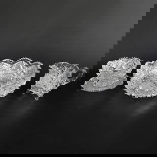 Group of Cut Glass, Three Items Total: Group of Cut Glass, Three Items Total, Includes One Cut Glass Bowl Having Scalloped Edges in Pinwheel Pattern, 8.25" Diameter, 3.5" High; Creamer Having Scalloped Top, Resting on Three Pedestal Feet