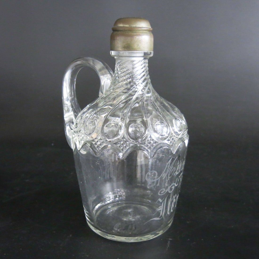 Cut Glass Jug: Cut Glass Jug, Having Handle, Brass Lid, Etched on Front Stating Merry Christmas, 1890, Alex and Co. 5.5" Wide, 4.75" Deep, 9" High