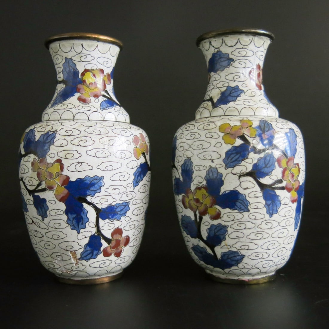 Cloisonne Cabinet Vases, Pair: Cloisonne Cabinet Vases, Pair, Having White Ground, Featuring Blue and Yellow Cherry Blossom Floral Decorations, Brass Lined Tops. 3" Diameter, 5.25" High