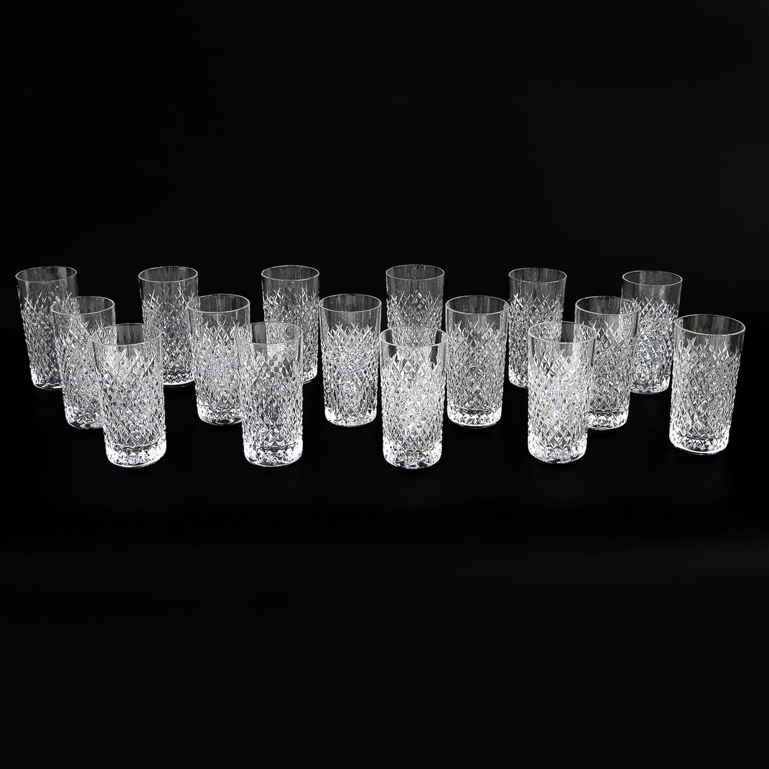 Set of Waterford Crystal Highball Glasses, Sixteen Total, In Alana Pattern: Set of Waterford Crystal Highball Glasses, Sixteen Total, In Alana Pattern, 12 ounces, Marked on Bottom. 2.75" Diameter, 5.75" High