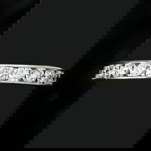 Tiffany & Company Platinum Natural Diamond Channel Set Eternity Ring, Size 6: Tiffany & Company Platinum Natural Diamond Channel Set Eternity Ring, Size 6, Consisting of Twenty (20) Round Brilliant Cut Diamonds Weighing a Total of 1.80 Carats. Diamonds are G in Color and VS in