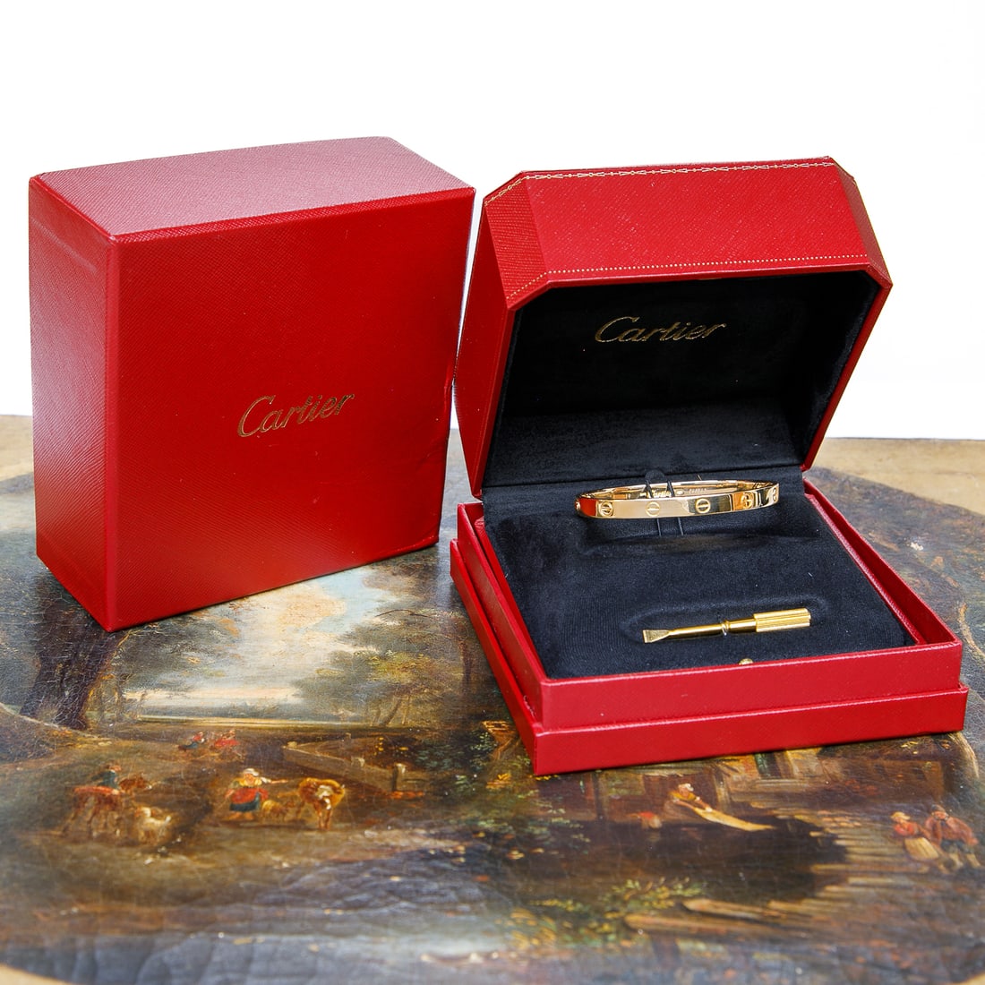 Cartier 18K Yellow Gold LOVE Bracelet, Size 18: Cartier 18K Yellow Gold LOVE Bracelet, Size 18, Box Included and Screwdriver. Retails at $7,950.00.