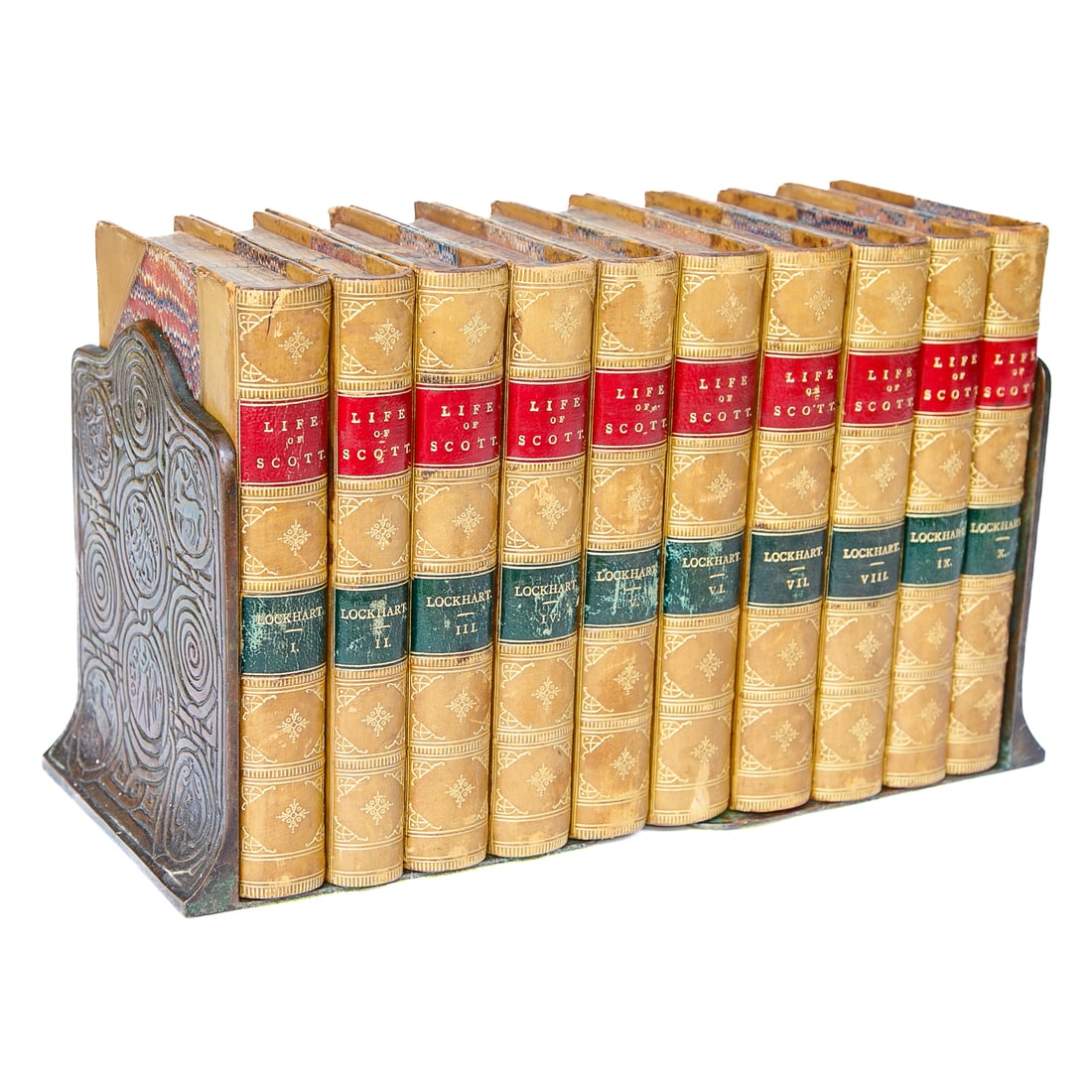 Tiffany Studios, New York, Bronze Bookends, Pair, Along With Memoirs of Sir Walter Scott: Tiffany Studios, New York, Bronze Bookends, Pair, Along with Memoirs of Sir Walter Scott Leather Bound Books; Bookends Early 20th C. Featuring Zodiac Pattern, Having Copper Patina and Verde Details on