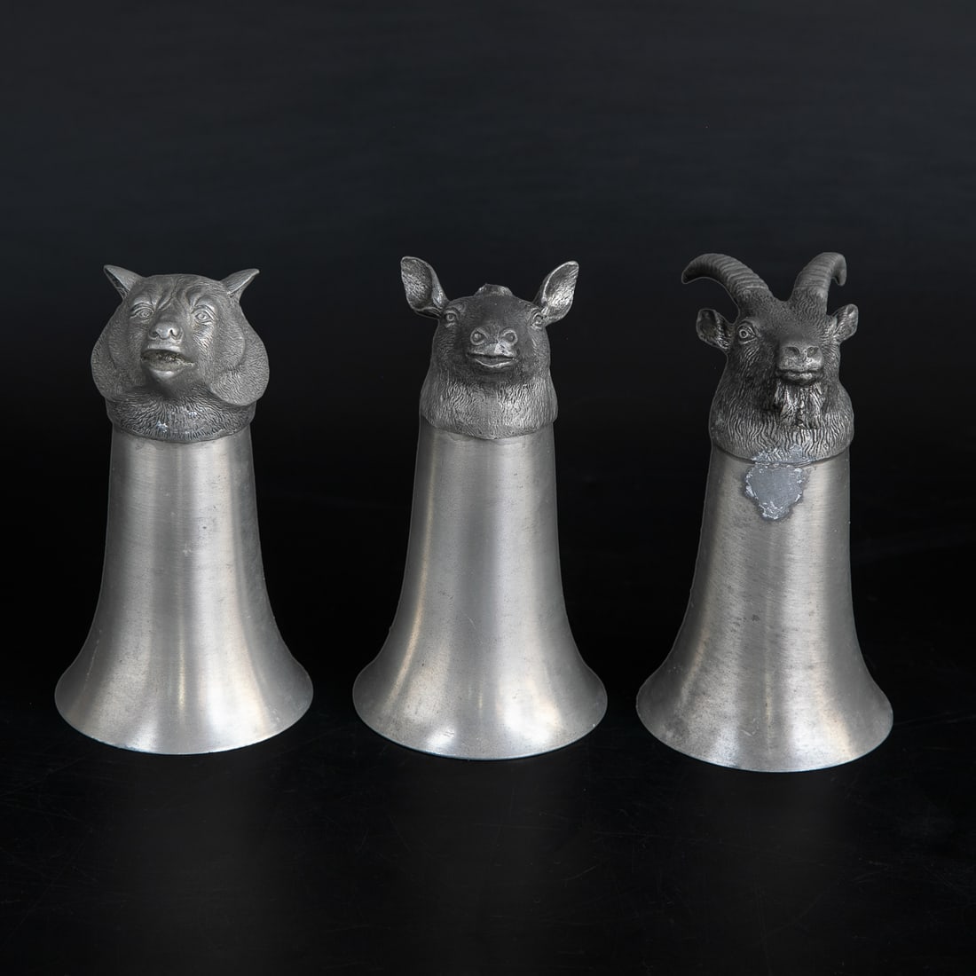 Pewter Animal Head Stirrup Cups, Three Total: Pewter Animal Head Stirrup Cups, Three Total, Includes One Bear Head Cup, One Cow Head Cup, and One Goat Head Cup. 5.25" High, 3" Diameter