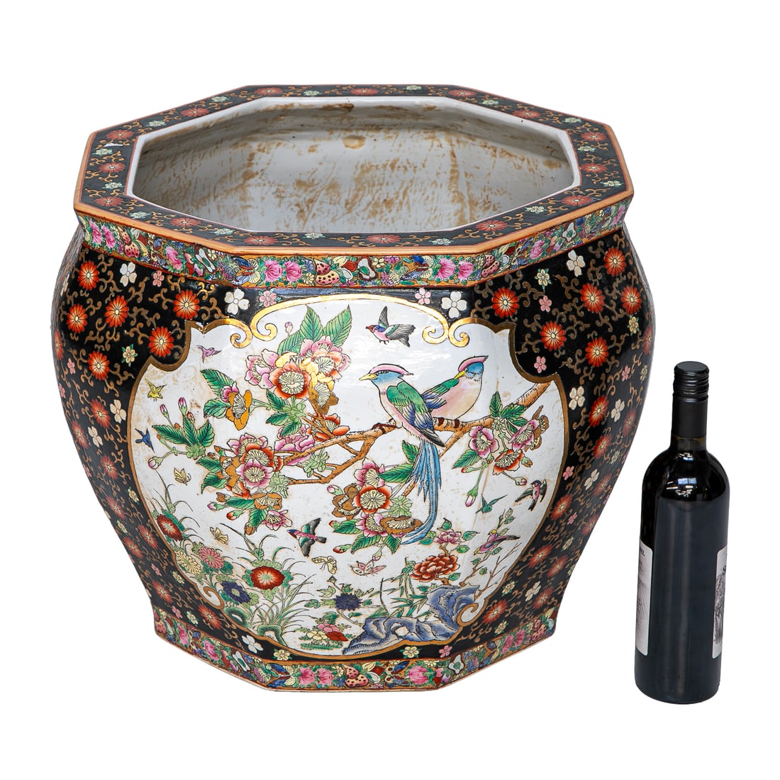 Vintage Octagonal Chinese Porcelain Planter: Vintage Octagonal Chinese Porcelain Planter, Having Ebony Ground, Top Features Multi Color Floral Design Edge, Body Features Same Multi Color Floral Designs Surrounding Four Panels Having White