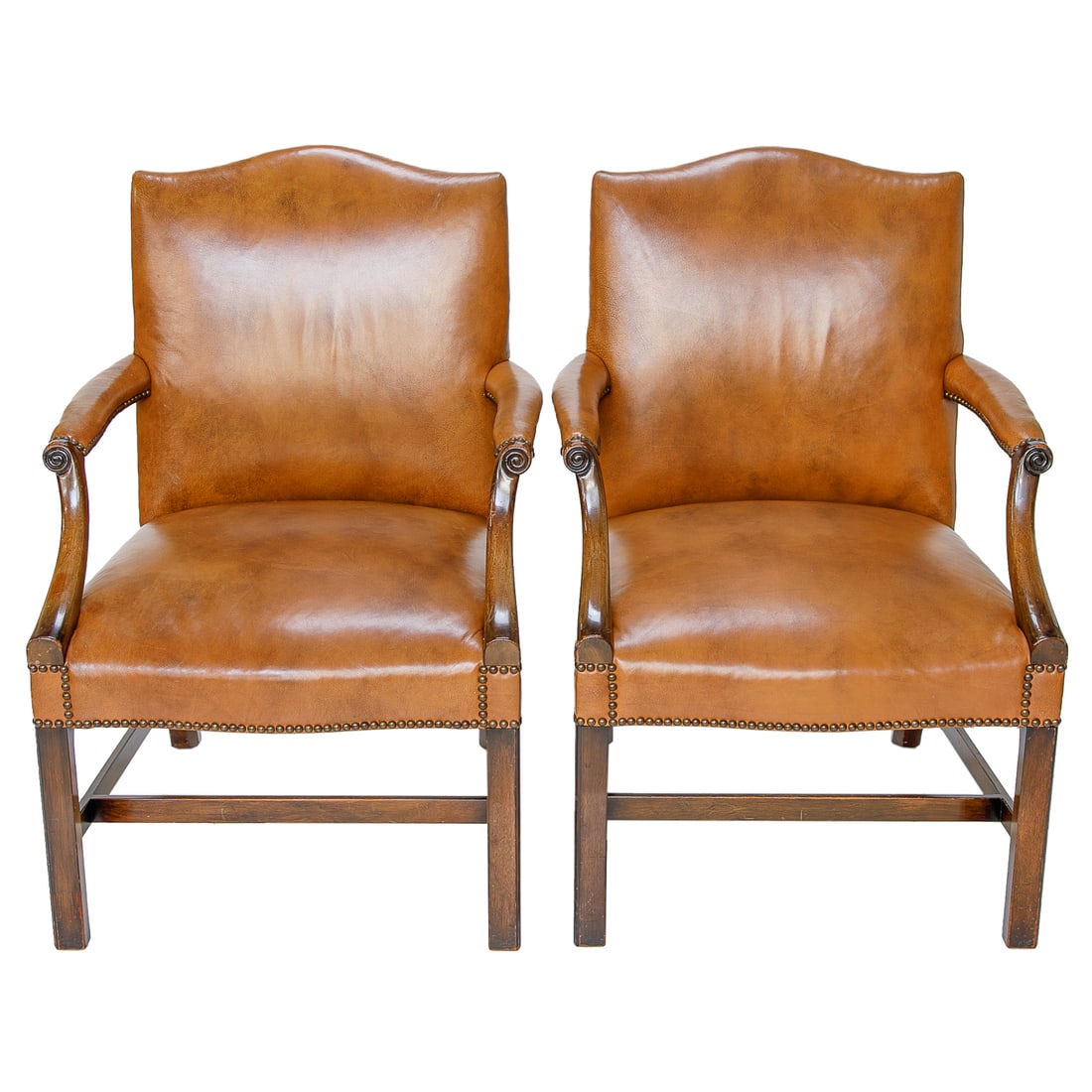 Pair of Vintage English Made Mahogany Gainsboro Style and Tobacco Leather Arm Chairs, Pair: Pair of Vintage English Made Mahogany Gainsboro Style and Tobacco Leather Arm Chairs, Pair, Having Shaped Back, Upholstered Manchettes, Curved Arms, Resting on Square Legs, Box Shape Support Stretcher