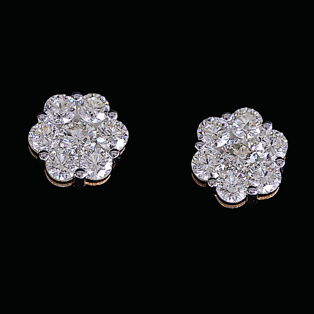 14K Yellow Gold Natural Diamond Cluster Earrings: 14K Yellow Gold Natural Diamond Cluster Earrings, Consisting of Fourteen (14) Natural Round Brilliant-Cut Diamonds Weighing 3.50 Carats. Diamonds are K in Color and VS in Clarity. Earrings Weigh 6.2 G
