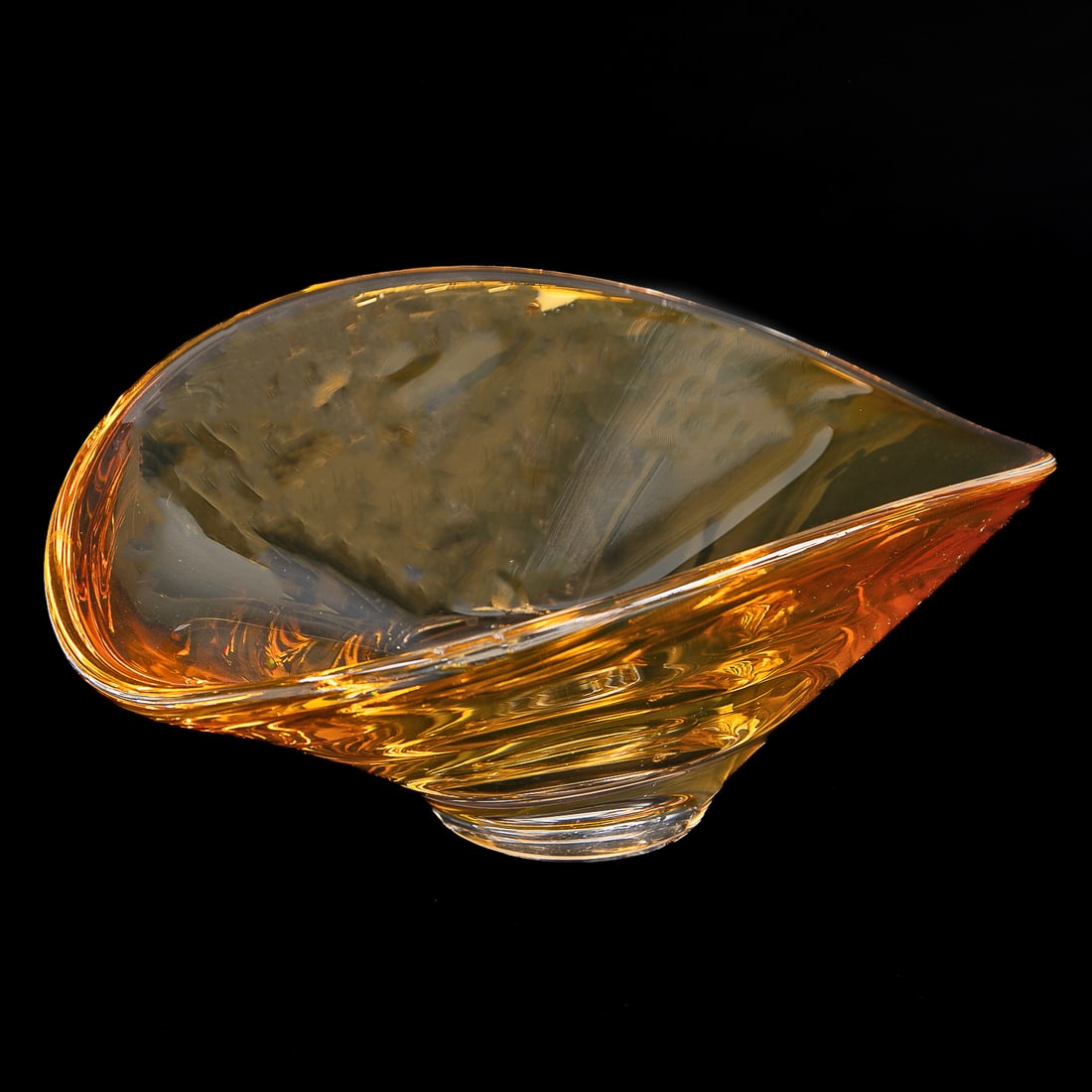 Goran Warff for Kosta Boda Oval Amber Glass Bowl: Goran Warff for Kosta Boda Oval Amber Glass Bowl, Signed on Bottom, Original Sticker on Side. 5" High, 12.5" Wide, 9.75" Deep