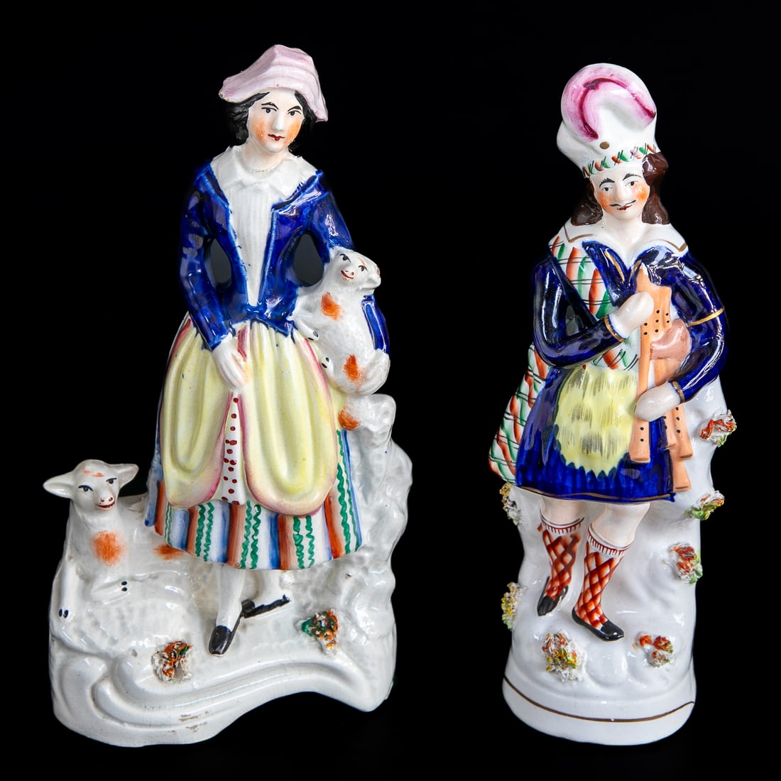 Late 19th C. Staffordshire Figures, Two Total: ,Late 19th C. Staffordshire Figures, Two Total, Includes One Female with Wearing Bonnet with Lambs, One Male Highlander, Wearing a Chapeau, Holding Musical Flageolet Instrument, Resting on Ground