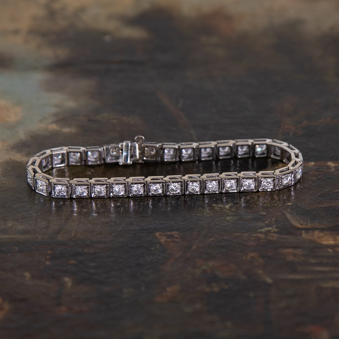 7.25 Inch 18K White Gold Natural Diamond Box Bracelet: 7.25 Inch 18K White Gold Natural Diamond Box Bracelet, Consisting of Thirty-Three (33) Round Brilliant-Cut Natural Diamonds Weighing 5.75 Carats. Diamonds are H in Color and VS in Clarity. Bracelet We