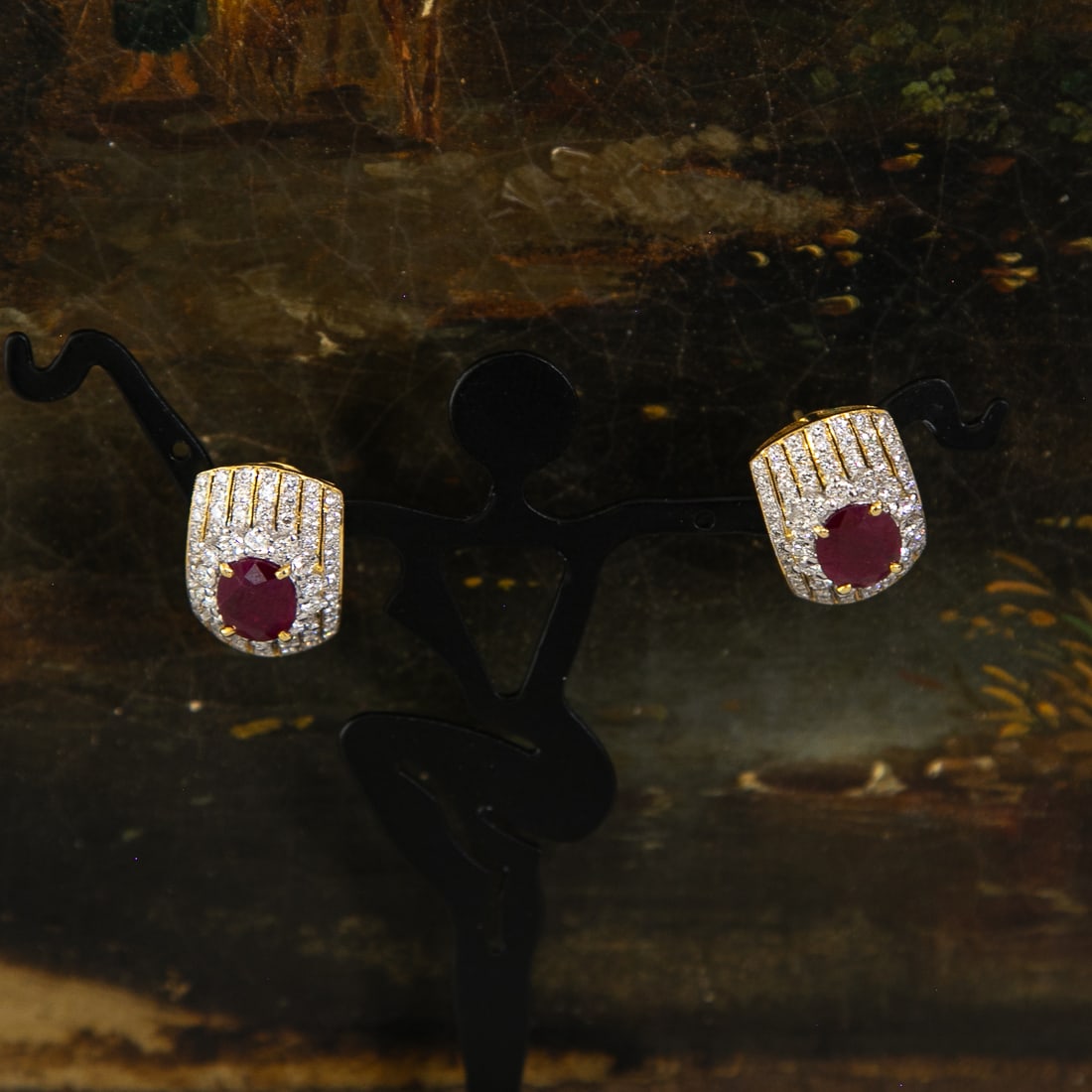 18K Yellow Gold Natural Burmese Ruby and Diamond Earrings: 18K Yellow Gold Natural Burmese Ruby and Diamond Earrings, Consisting of Two (2) Oval Burmese Rubies Weighing 2.60 Carats. Rubies Have an AGL Report Number 1151189. Earrings Also Contain 140 Natural D