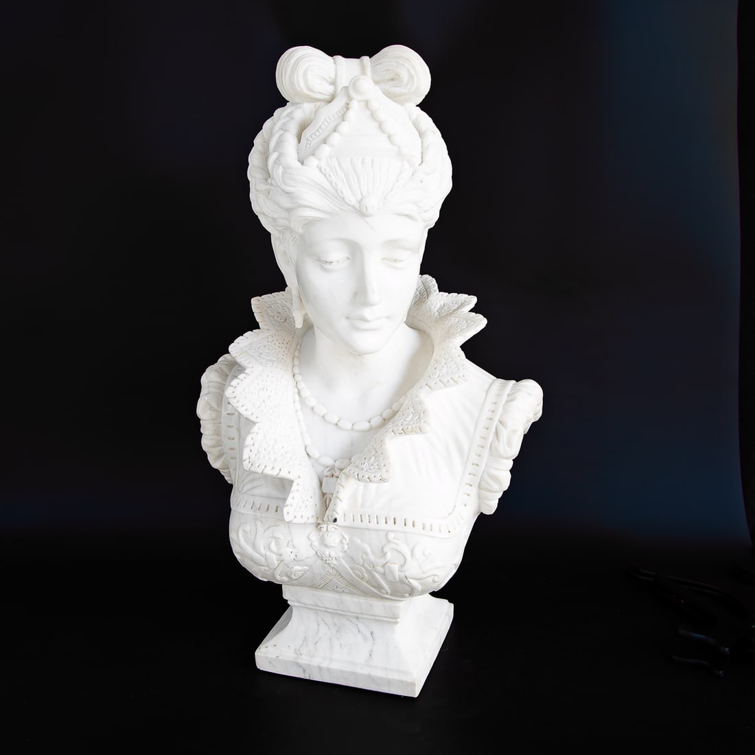 Antique Tudor Style Carved Marble Female Portrait Bust: Antique Tudor Style Carved Marble Female Portrait Bust, Depicting Female Wearing Crown Atop Braids, Double Layer Necklace, Lace Collar, Detailed Sleeves, Floral Design Dress, Resting on Plinth Style B