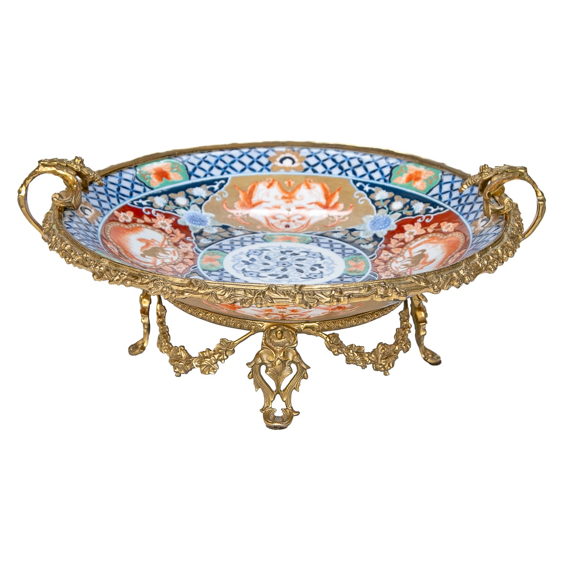 Late 19th C. Bronze Mounted Japanese Imari Centerpiece: Late 19th C. Bronze Mounted Japanese Imari Centerpiece, Having Floral and Scroll Form Handles, Floral Design Edge, Floral Swags on Sides, Resting on Pierced Floral and Leaf Form Feet, Centerpiece