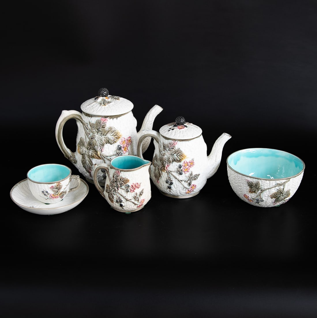 Late 19th C. Wedgwood Argenta Berry Pattern Partial Tea Service, Six Total Pieces: Late 19th C. Wedgwood Argenta Berry Pattern Partial Tea Service, Six Total Pieces, Includes Two Tea Pots, One Cup and Saucer, One Creamer and One Waste Bowl, All Having White Ground, Multi Color Leaf