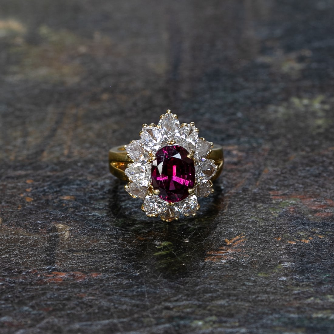 18K Yellow Gold Oval Ruby and Diamond Ring, Size 6.25: 18K Yellow Gold Oval Ruby and Diamond Ring, Size 6.25, Consisting of One Natural Ruby Weighing 3.09 Carats. Ruby has a GIA Report #1236531692. Ring Also Contains Twelve (12) Natural Pear Shaped Diamon