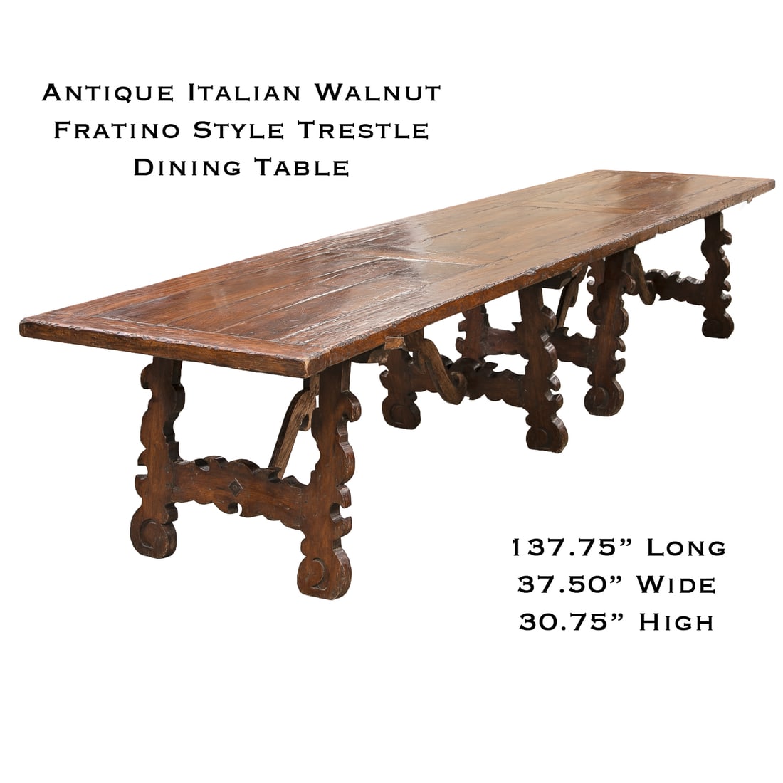 Antique Italian Walnut Fratino Style Trestle Dining Table: Antique Italian Walnut Fratino Style Trestle Dining Table, Having Thick Plank Board Top, Resting on Four Carved Inwardly Canted Trestle Style Legs, Scroll Form Carved Supports, Terminating in Scroll F
