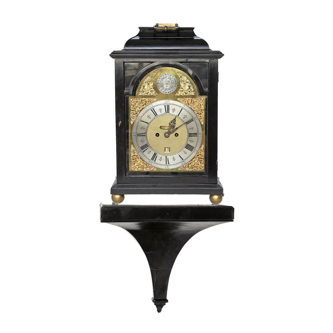 Late 19th C. English Georgian Style Ebonized Case Bracket Clock: Late 19th C. English Georgian Style Ebonized Case Bracket Clock, Having Ebonized Case, Brass Handle on Top, Brass and Silver Dial Face, Sun Featured at Top, Ebony Roman Numerals and Minute Markers, Eb