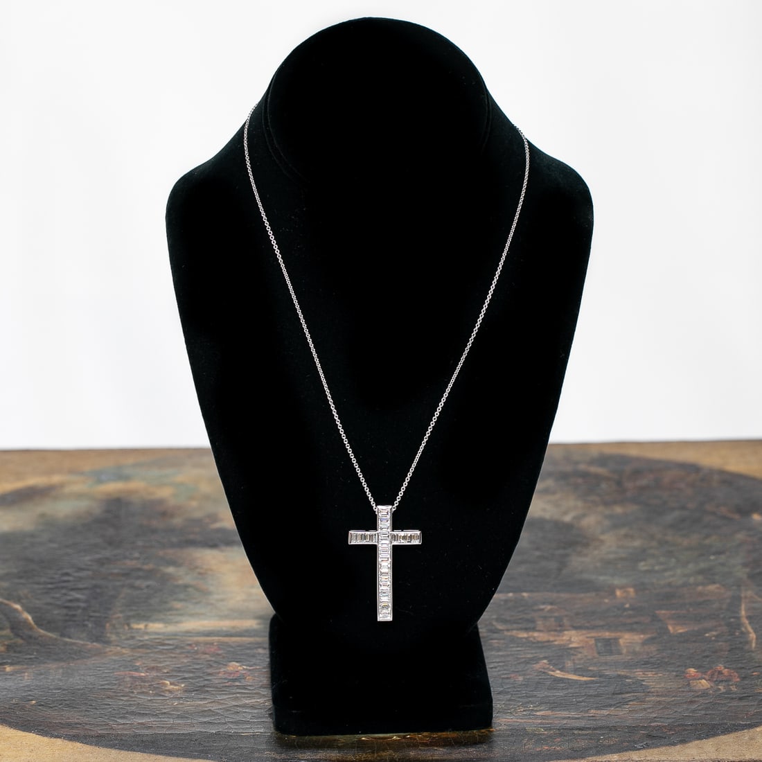 18 Inch Platinum Diamond Cross Pendant: 18 Inch Platinum Diamond Cross Pendant, Consisting of Twenty-Three (23) Natural Baguette Diamonds Weighing 6.00 Carats. Diamonds are F in Color and VS in Clarity. Pendant Weighs 13.0 Grams.