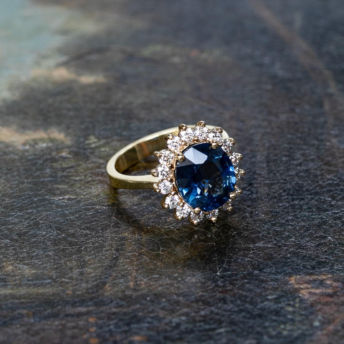 18K Yellow Gold Blue Sapphire and Diamond Ring, Size 6.5: 18K Yellow Gold Blue Sapphire and Diamond Ring, Size 6.5, Consisting of One Natural Oval Blue Sapphire Weighing 4.80 Carats and Sixteen (16) Natural Round Brilliant-Cut Diamonds Weighing .60 Carats