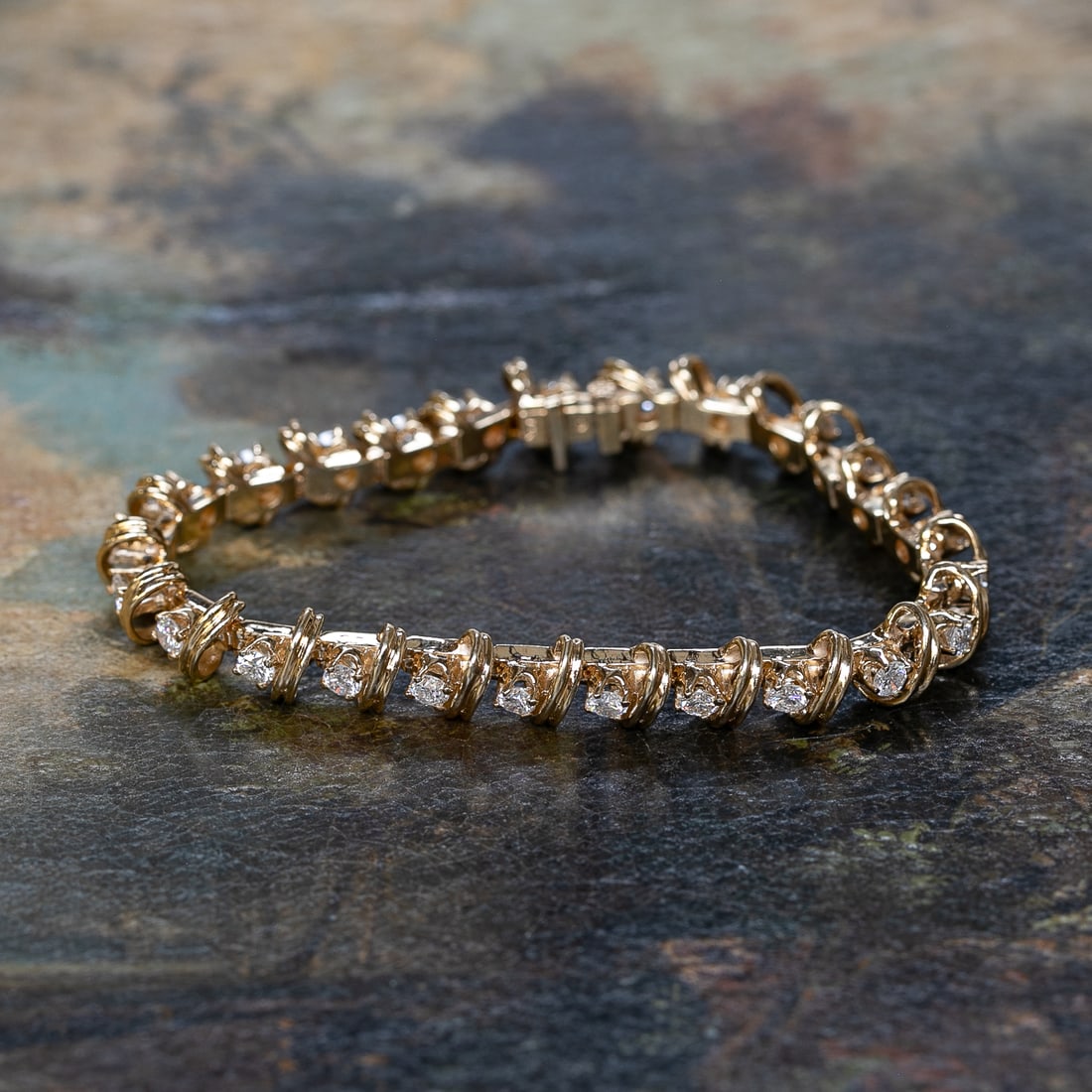 7.25 Inch 14K Yellow Gold Diamond Bracelet: 7.25 Inch 14K Yellow Gold Diamond Bracelet, Consisting of Twenty-Five (25) Natural Round Brilliant-Cut Diamonds Weighing a Total of 4.00 Carats. Diamonds are H in Color and VS-SI in Clarity.