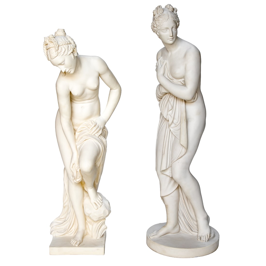 Vintage Italian Composite/Bonded Marble Classical Female Sculptures, Two Total: Vintage Italian Composite/Bonded Marble Classical Female Sculptures, Two Total, Includes One Amilcare Santini Nude Female Featuring Cloth Draped Over Knee, Standing on Rock Form, Resting on Square Bas