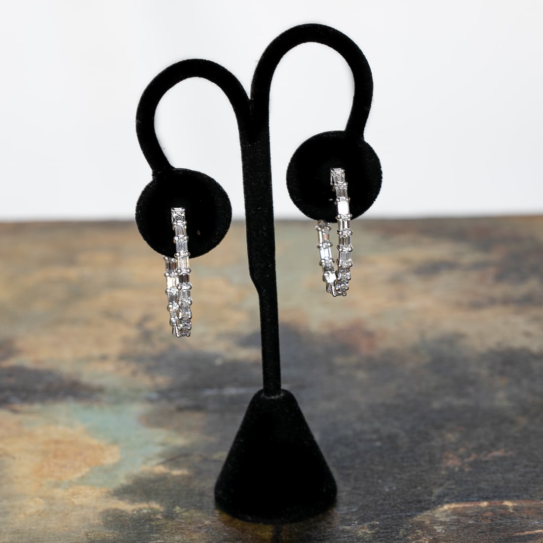 18K White Gold Diamond In & Out Hoop Earrings: 18K White Gold Diamond In & Out Hoop Earrings, Consisting of Thirty-Two (32) Natural Emerald-Cut Diamonds Weighing a Total of 6.28 Carats. Diamonds are G in Color and VS in Clarity. Earrings Weigh 10.