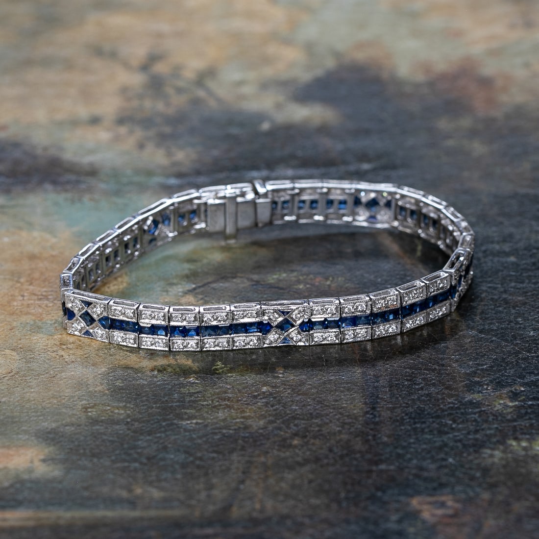 7 Inch 18K White Gold Art Deco Style Blue Sapphire and Round Diamond Bracelet: 7 Inch 18K White Gold Art Deco Style Blue Sapphire and Round Diamond Bracelet, Consisting of Seventy-One (71) Blue Sapphires Weighing 5.00 Carats and One Hundred Twenty-Four (124) Natural Round Diamon