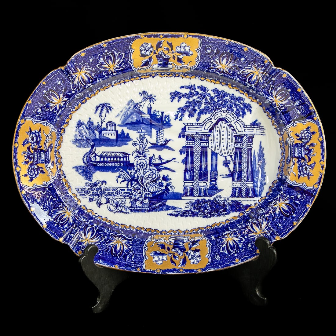 Antique English Copeland Porcelain Tree Well Platter: Antique English Copeland Porcelain Tree Well Platter, Having Alternating Panels of Gold Florals with Cobalt Blue Florals, Center Features Oriental Boats, Floral Arrangements and Buildings, Signed on B