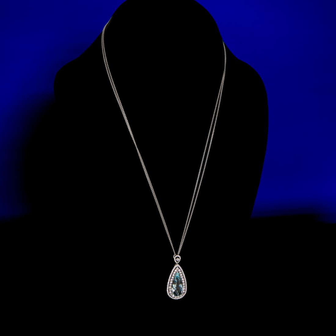 18 Inch 14K White Gold Natural Aquamarine and Diamond Pendant: 18 Inch 14K White Gold Natural Aquamarine and Diamond Pendant, Consisting of One Natural Pear-Shaped Aquamarine Weighing 10.00 Carats and One Hundred (100) Round Brilliant-Cut Diamonds Weighing 1.50 C