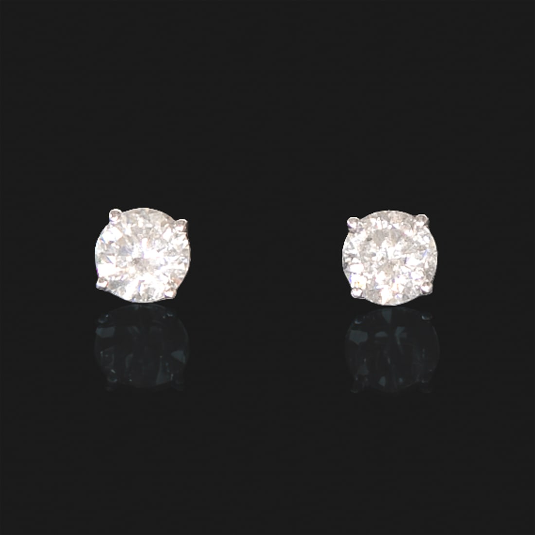 14K White Gold Natural Diamond Stud Earrings: 14K White Gold Natural Diamond Stud Earrings, Consisting of Two (2) Natural Round Brilliant-Cut Diamonds Weighing 2.95 Carats. Diamonds are G in Color and SI3 in Clarity.