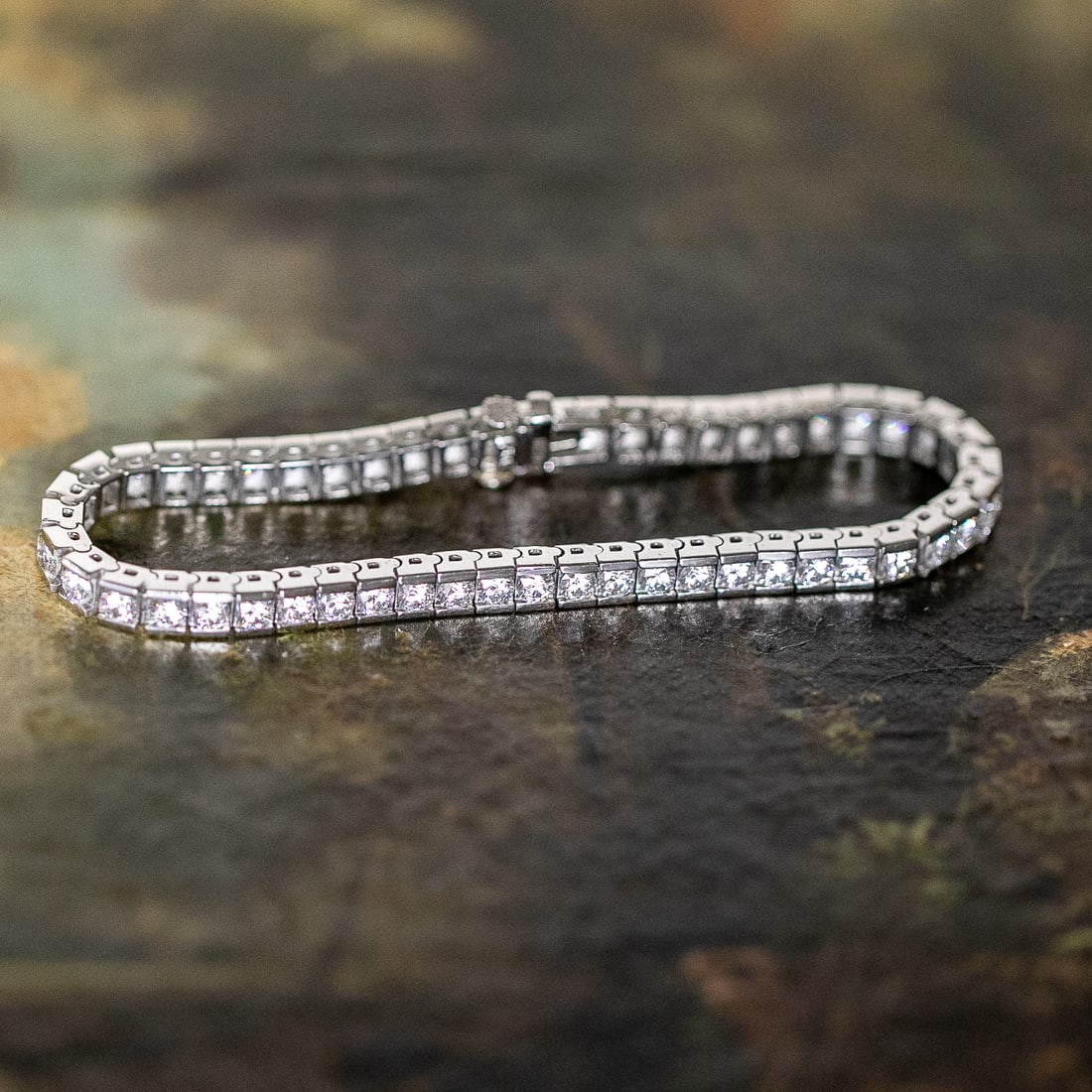 7 Inch Platinum Natural Diamond Channel Set Bracelet: 7 Inch Platinum Natural Diamond Channel Set Bracelet, Consisting of Fifty-Two (52) Natural Round Brilliant-Cut Diamonds Weighing a Total of .623 Carats. Diamonds are F in Color and VS in Clarity. Brac