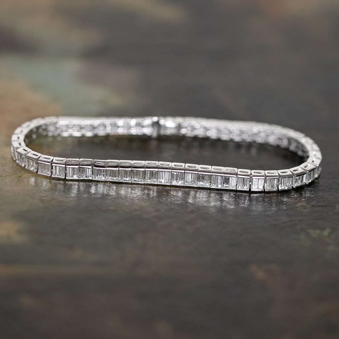 7 Inch Platinum Natural Diamond Bracelet: 7 Inch Platinum Natural Diamond Bracelet, Consisting of One Hundred Thirty-One (131) Natural Baguette Diamonds Weighing a Total of 5.00 Carats. Diamonds are G in Color and VS in Clarity.