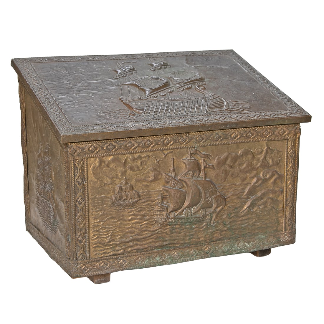 Antique Scottish Hammered Brass Scuttle Box: Antique Scottish Hammered Brass Scuttle Box, Having Slant Top, Hinged Lid, Top Front and Sides All Feature Ship and Wave Designs, Floral Borders. 14.5" High, 20" Wide, 13" Deep