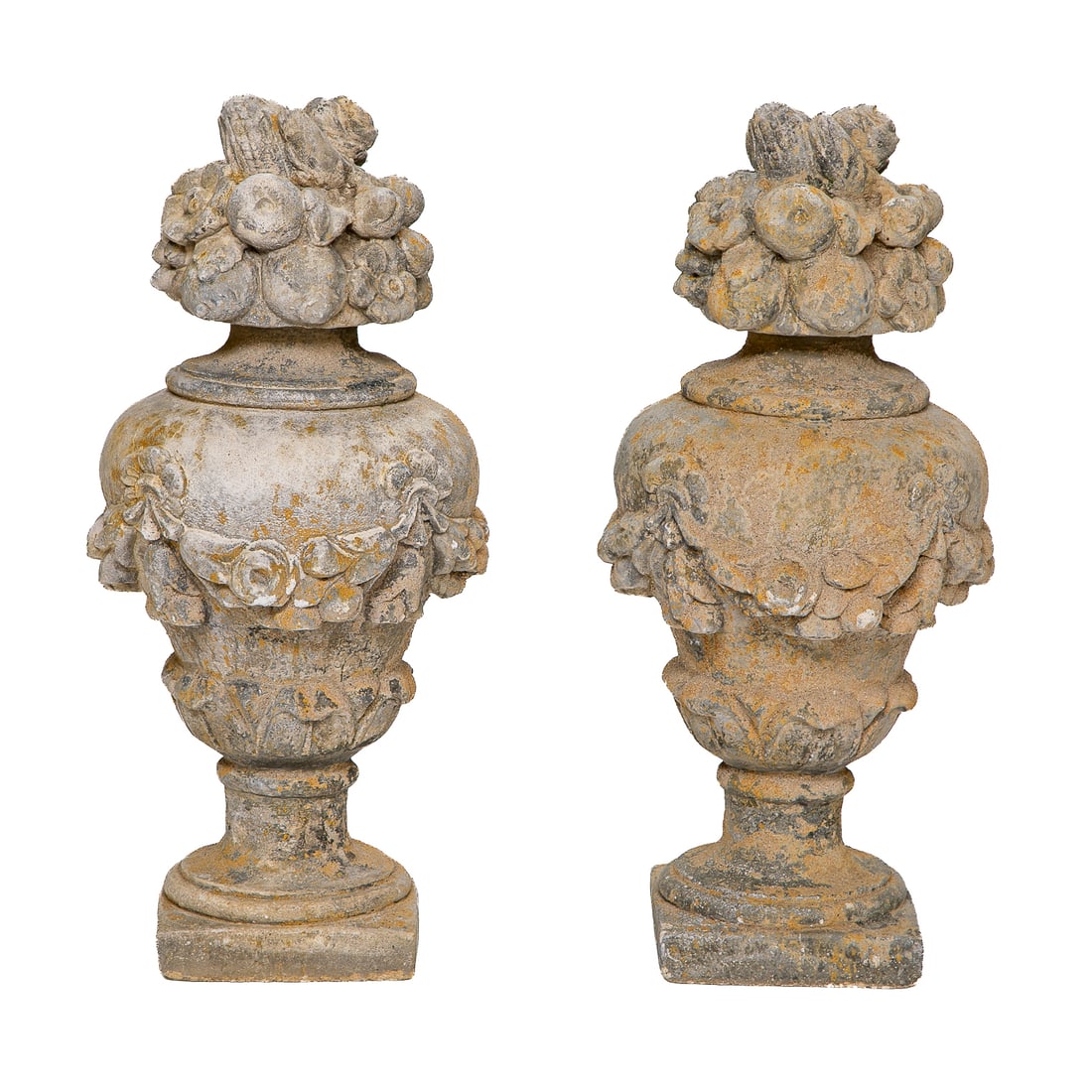 Vintage French Cast Stone Outdoor Sculptures, Pair: Vintage French Cast Stone Outdoor Sculptures, Pair, Having Multi Fruit Form Top, Urn Form Body Featuring Floral Swag, Leaf Form on Socle, Resting on Square Base. 31" High, 15" Diameter (One Has Chip