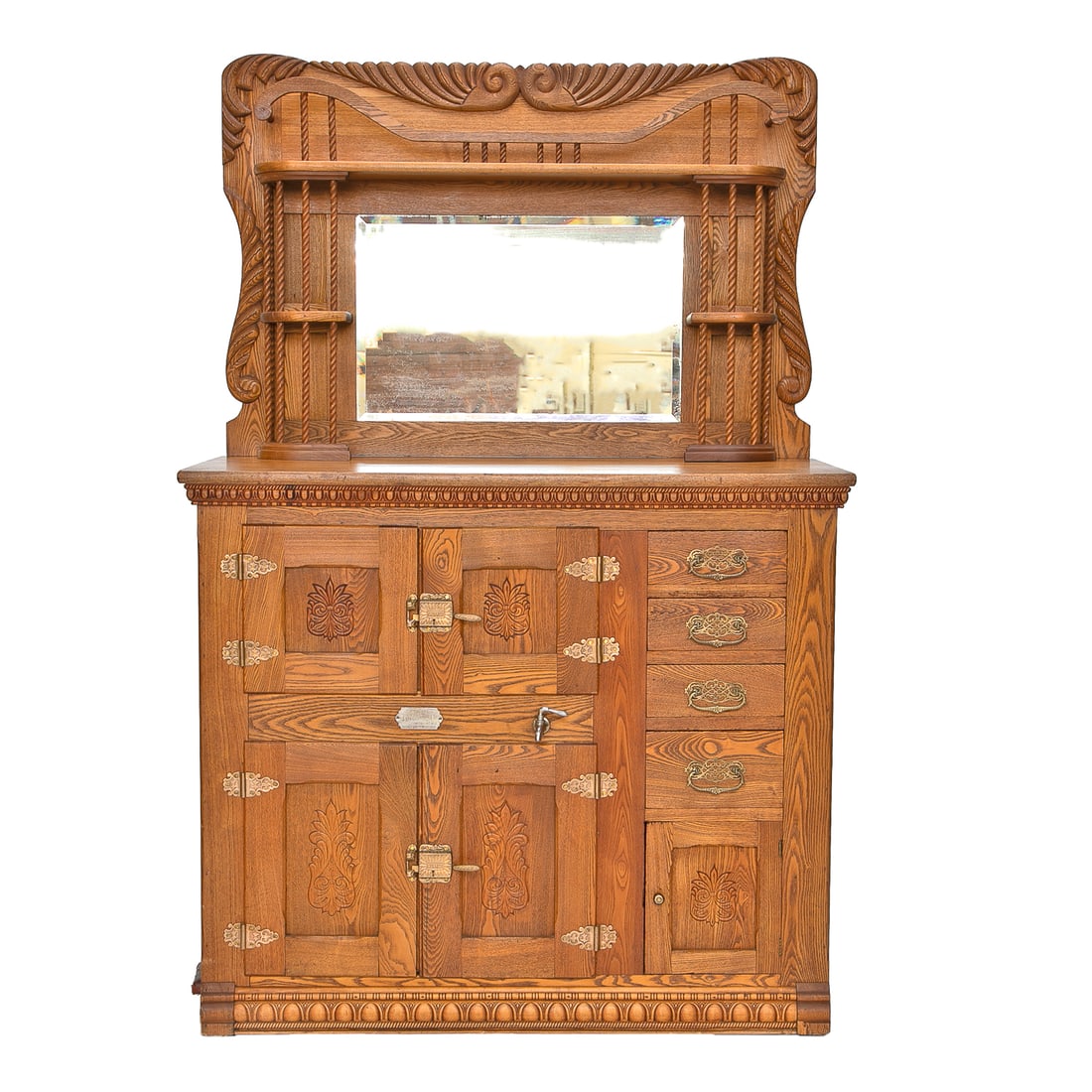 Unique Gurney Refrigerator Company, Wisconsin, Oak Ice Box: Unique Gurney Refrigerator Company, Wisconsin, Oak Ice Box, Having Carved Back Cabinet Featuring Leaf Carved Top and Sides, One Large Shelf Center Top, Mid Shelves on Left and Right, All Having Rope C